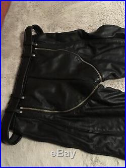 black leather trousers with zips