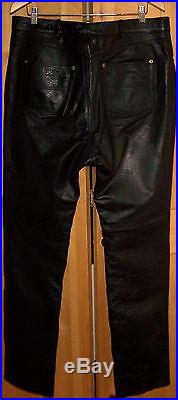 BARELY WORN MEN'S LEATHER MOTORCYCLE PANTS. SIZE 36X34-36 FREE PRIORITY SHIP