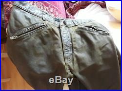 DKNY men's leather trousers size 36 with ankle zips and pattern stitching on leg